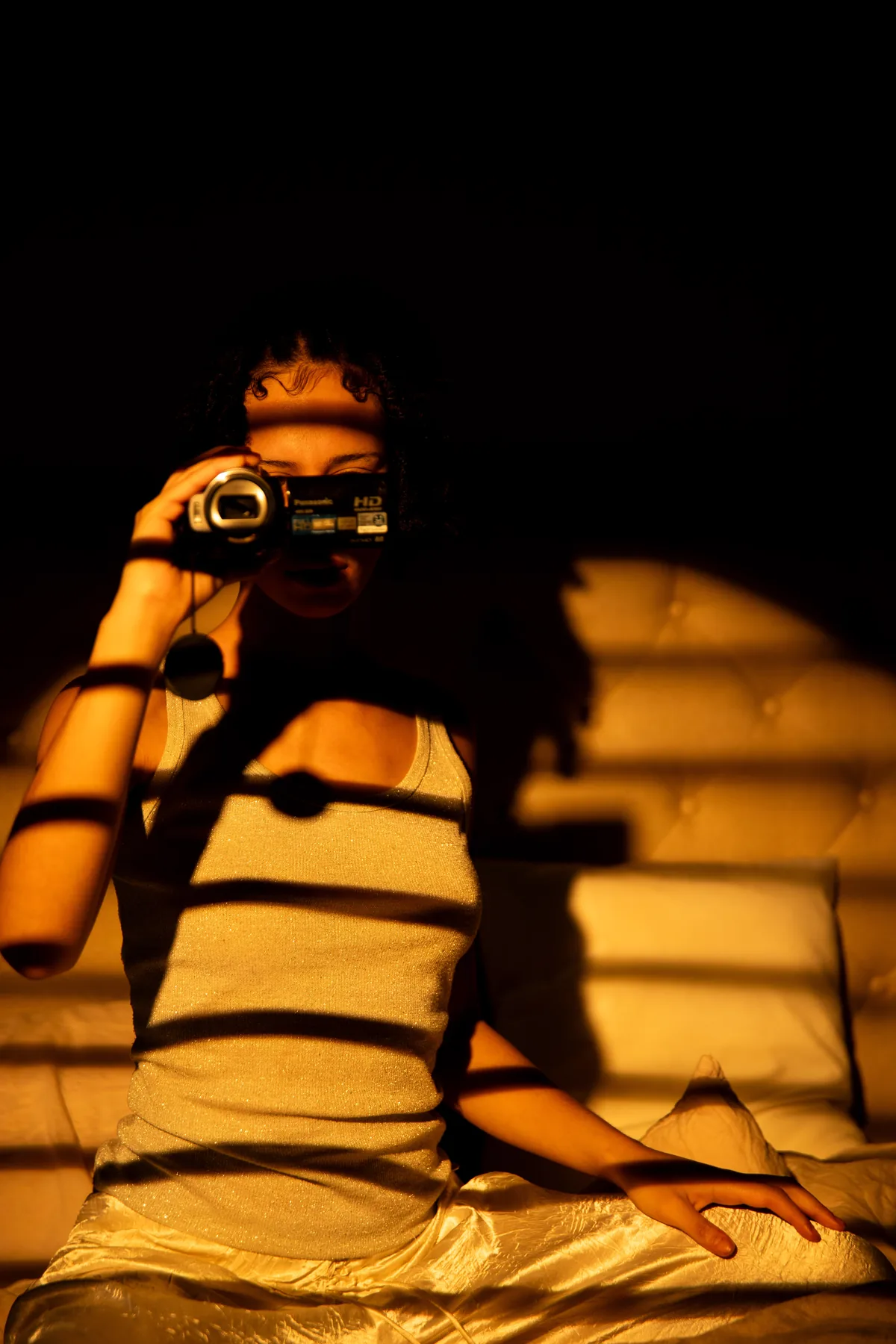 Backlit portrait with shadow patterns by Okan Pictures