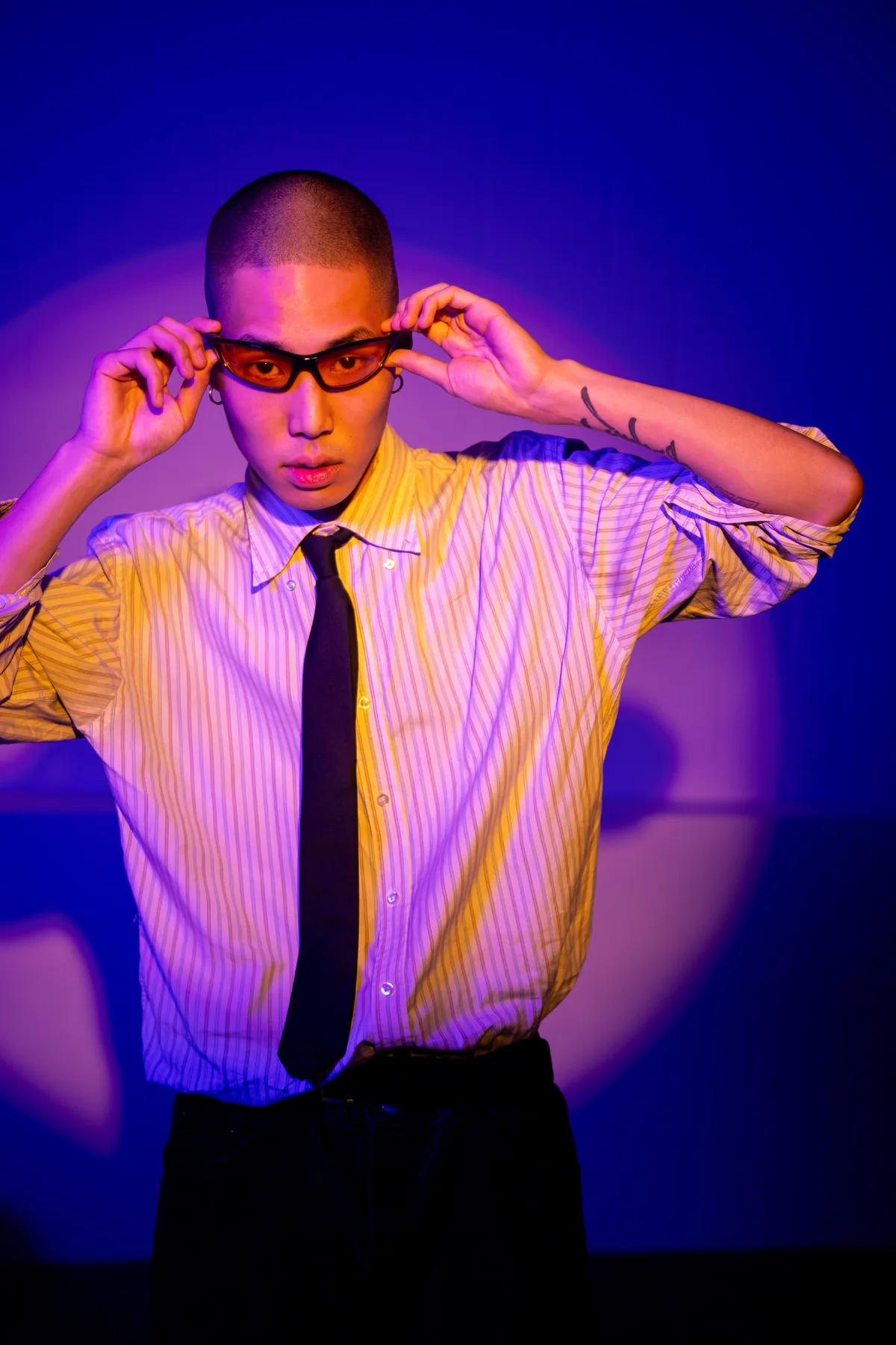 Portrait with blue and orange colour gels by Okan Pictures