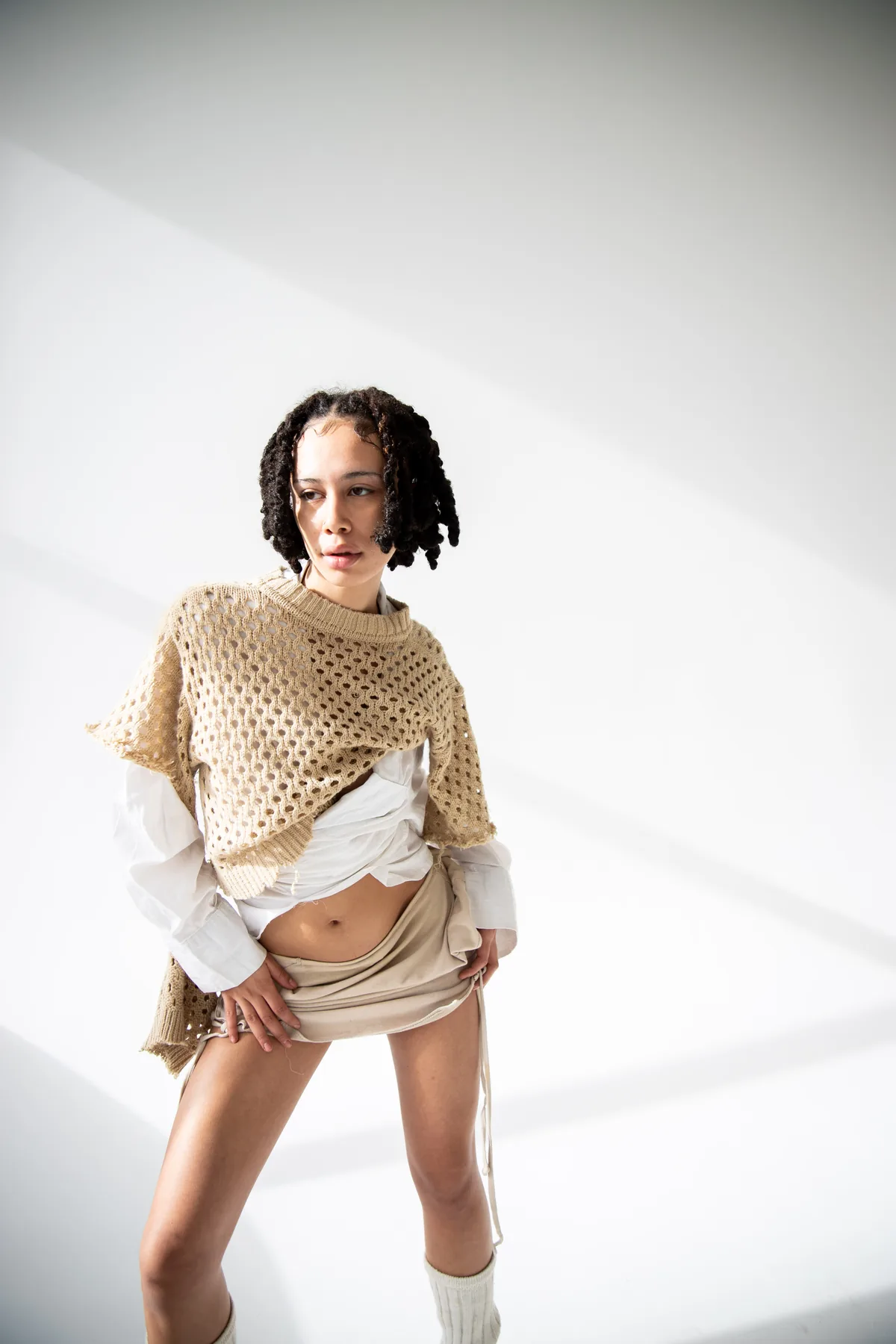 Studio portrait on white by Okan Pictures